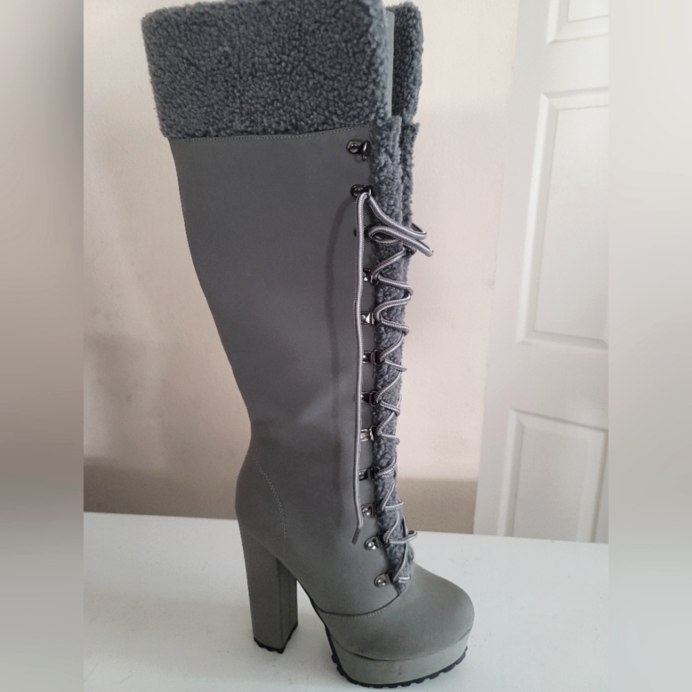 Knee high grey heeled boots